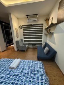 Ένα ή περισσότερα κρεβάτια σε δωμάτιο στο Monde Residence Block C Number 21, Batam Centre