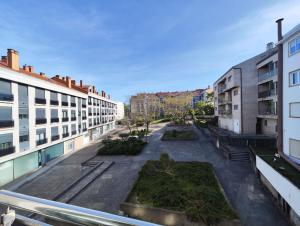 a view of a courtyard of an apartment building at Apartamento centro Nigrán in Nigrán