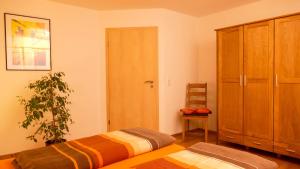 Postel nebo postele na pokoji v ubytování Wetekams Ferienwohnung W1
