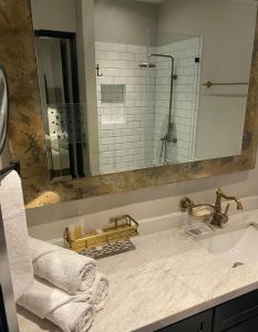 a bathroom with a sink and a mirror at Hotel Verbena in San Miguel de Allende