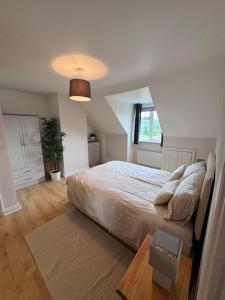 Postel nebo postele na pokoji v ubytování Clare Homestay