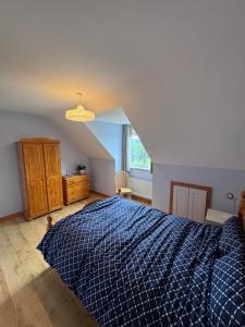 Postel nebo postele na pokoji v ubytování Clare Homestay