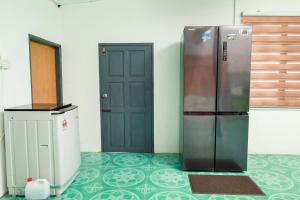 Billede fra billedgalleriet på D'BALI HOMESTAY - Private Swimming Pool, NETFLIX, Internet Wifi ,Cuckoo, Internet Wifi , Dryer, Washing Machine, Aircond Setiap Bilik & Ruang Tamu i Pasir Puteh + 13 billeder