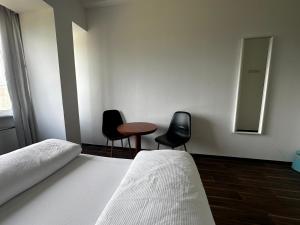 Postel nebo postele na pokoji v ubytování Ootel.com