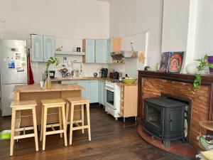 Eldhús eða eldhúskrókur á Appartement ancien