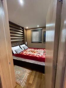 Ένα ή περισσότερα κρεβάτια σε δωμάτιο στο Vila PAHULJA A6