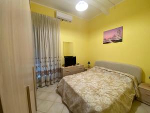 Posteľ alebo postele v izbe v ubytovaní Casa vacanza DL