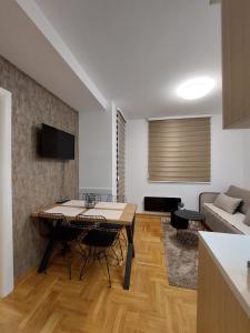 TV a/nebo společenská místnost v ubytování Apartman Loly Zlatibor