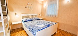 Posteľ alebo postele v izbe v ubytovaní Simic Apartments
