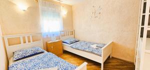 Posteľ alebo postele v izbe v ubytovaní Simic Apartments