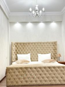 Voodi või voodid majutusasutuse Armenia Hotel toas