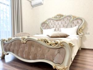 Voodi või voodid majutusasutuse Armenia Hotel toas