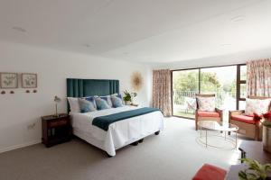 Postel nebo postele na pokoji v ubytování Hibiscus House + 24 fotografií