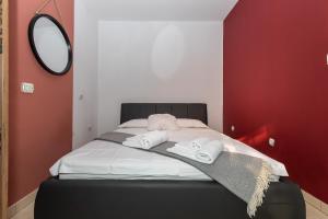 Postel nebo postele na pokoji v ubytování Holiday Home Rajna