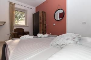Postel nebo postele na pokoji v ubytování Holiday Home Rajna