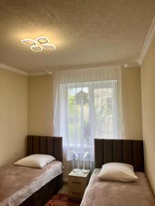 Postel nebo postele na pokoji v ubytování Inexpensive house