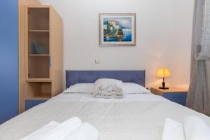 Postel nebo postele na pokoji v ubytování Holiday Home Rajna