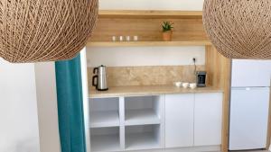 Kuchyň nebo kuchyňský kout v ubytování Eski Kapı Datça