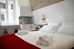 Posteľ alebo postele v izbe v ubytovaní New Joyful Guest House