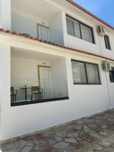a view of the outside of a house with a patio at Villa White in Ksamil