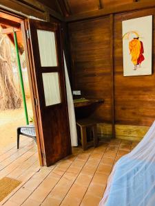 Postel nebo postele na pokoji v ubytování Cool Banyan Cabana