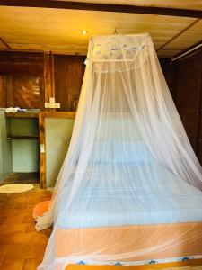 Letto o letti in una camera di Cool Banyan Cabana