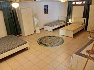 Ένα ή περισσότερα κρεβάτια σε δωμάτιο στο Villa Ines tra mare e lago
