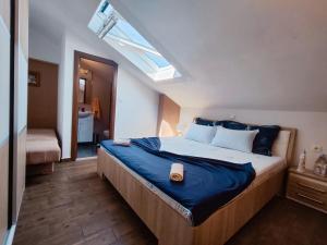 Posteľ alebo postele v izbe v ubytovaní APARTMANI NADA MUSTAPIC