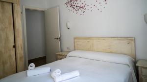 Posteľ alebo postele v izbe v ubytovaní Rural Tarifa Villa María