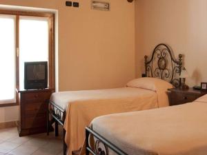 Voodi või voodid majutusasutuse La Cavallina azienda agrituristica toas