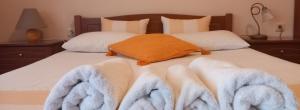 Posteľ alebo postele v izbe v ubytovaní Maridatis Apartments