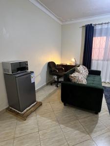 Posezení v ubytování Moon Suites Bukoto