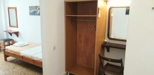 Postel nebo postele na pokoji v ubytování Ilias Place