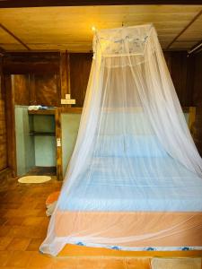 Letto o letti in una camera di Cool Banyan Cabana