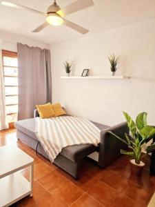Ένα ή περισσότερα κρεβάτια σε δωμάτιο στο Comfortable centrally located apartment