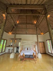 Katil atau katil-katil dalam bilik di Thani Villa Ubud