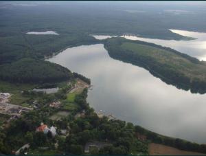 an aerial view of a large body of water at Domek w Zaciszu in Cieszyno