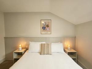 Voodi või voodid majutusasutuse Tatlers Guest House toas