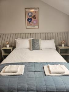 Voodi või voodid majutusasutuse Tatlers Guest House toas