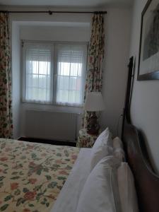 Postel nebo postele na pokoji v ubytování Hotel Los Caspios
