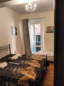 A bed or beds in a room at Pitico port apartment