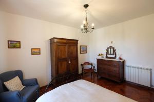 Posteľ alebo postele v izbe v ubytovaní Il Melograno - San Quirico d'Orcia