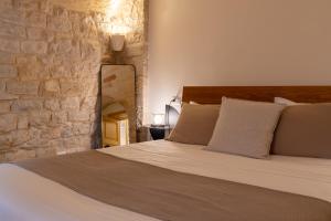 Postel nebo postele na pokoji v ubytování B&B Palazzo Vittoria