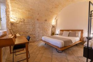 Postel nebo postele na pokoji v ubytování B&B Palazzo Vittoria