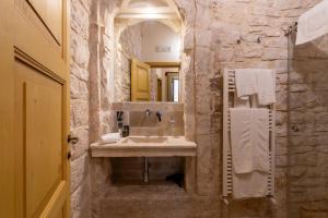 Koupelna v ubytování B&B Palazzo Vittoria + 37 fotografií