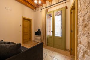 TV a/nebo společenská místnost v ubytování B&B Palazzo Vittoria