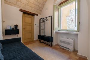 Postel nebo postele na pokoji v ubytování B&B Palazzo Vittoria