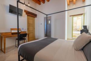 TV a/nebo společenská místnost v ubytování B&B Palazzo Vittoria