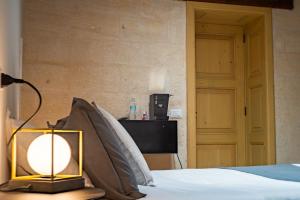 Postel nebo postele na pokoji v ubytování B&B Palazzo Vittoria