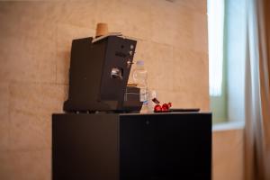 Kuchyň nebo kuchyňský kout v ubytování B&B Palazzo Vittoria